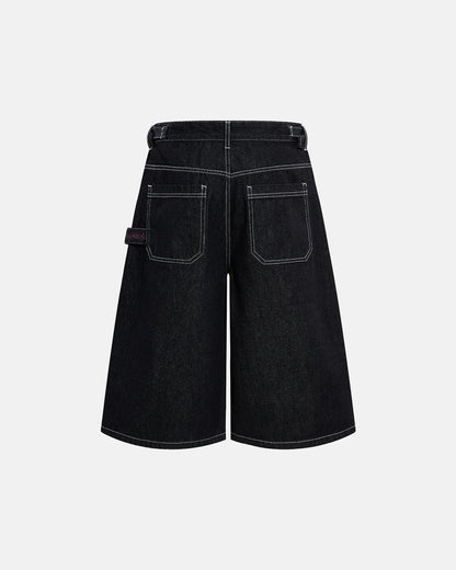 clean minimal jorts in dark raw denim with contrast stitching