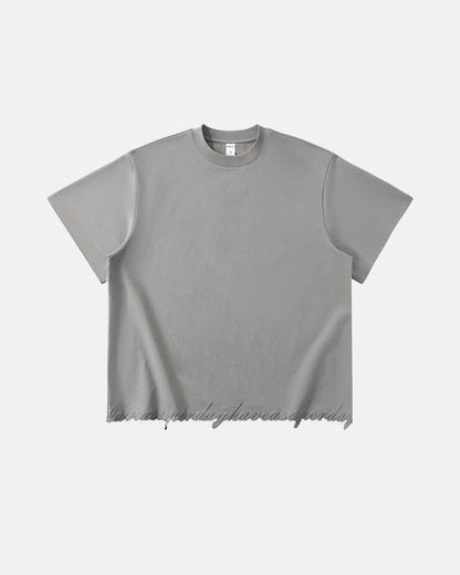 Grey oversized t-shirt with embroidered hem detail